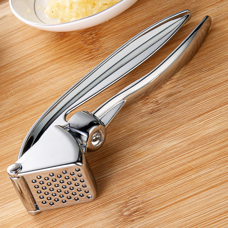 ORANGLES Stainless Steel Manual Garlic Press Masher - high resolution display - exposing craftsmanship - Image 2 of 4 | built for everyone | Stainless Steel Manual Garlic Press Masher for sale Georgia | Free Shipping ORANGLES