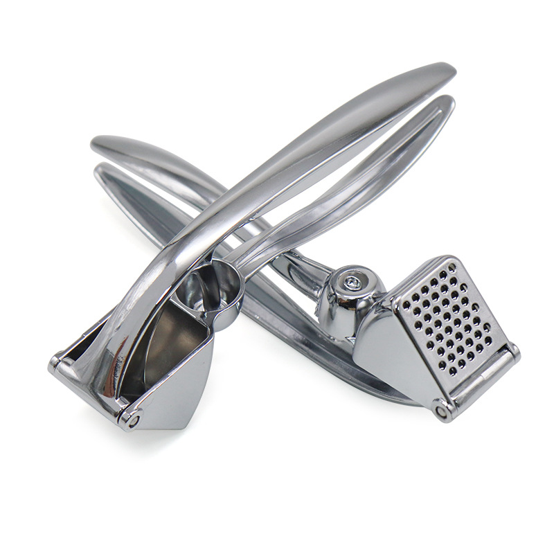 ORANGLES Stainless Steel Manual Garlic Press Masher - angled perspective - presenting advantages - Image 4 of 4 | fits any environment | Purchase Stainless Steel Manual Garlic Press Masher Michigan | Free Shipping ORANGLES