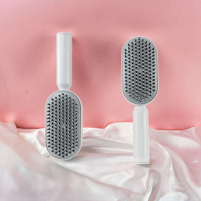 ORANGLES Hair Comb Anti‑Static Detangler with Soft Bristles and Ergonomic Scalp Care Design - detailed closeup view - illustrating benefits - Image 3 of 4 | created for all | Shop Hair Comb Anti‑Static Detangler with Soft Bristles and Ergonomic Scalp Care Design North Carolina | Free Shipping ORANGLES