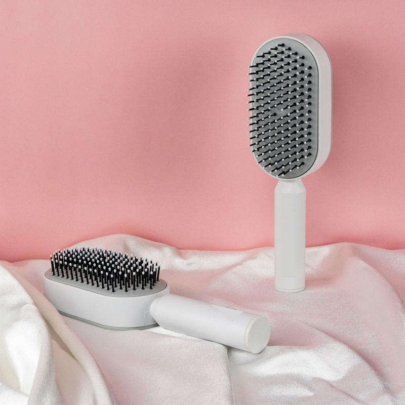 ORANGLES Hair Comb Anti‑Static Detangler with Soft Bristles and Ergonomic Scalp Care Design - angled perspective - presenting advantages - Image 4 of 4 | fits any environment | Purchase Hair Comb Anti‑Static Detangler with Soft Bristles and Ergonomic Scalp Care Design Michigan | Free Shipping ORANGLES